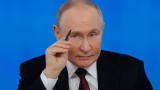 Russian President Vladimir Putin winks during his annual televised year-end press conference and phone-in held in Moscow, Russia December 19, 2024.