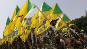 Kataib Hizbullah di Baghdad Iraq by Reuters e1577702977600