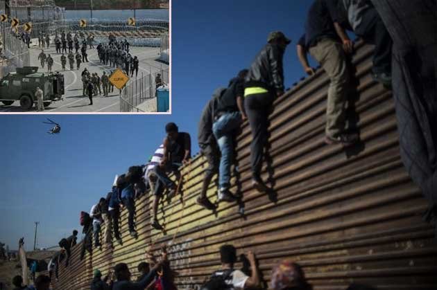 tijuana migran panjat